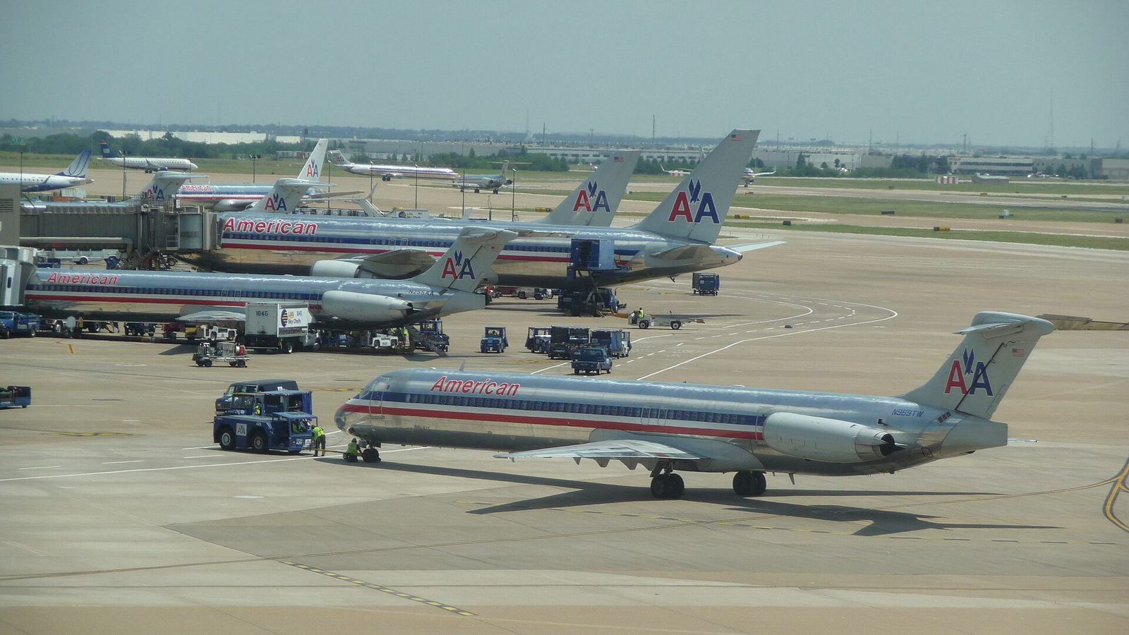 American Airlines jets parked at their gates at DFW, the larger of the two Dallas airports