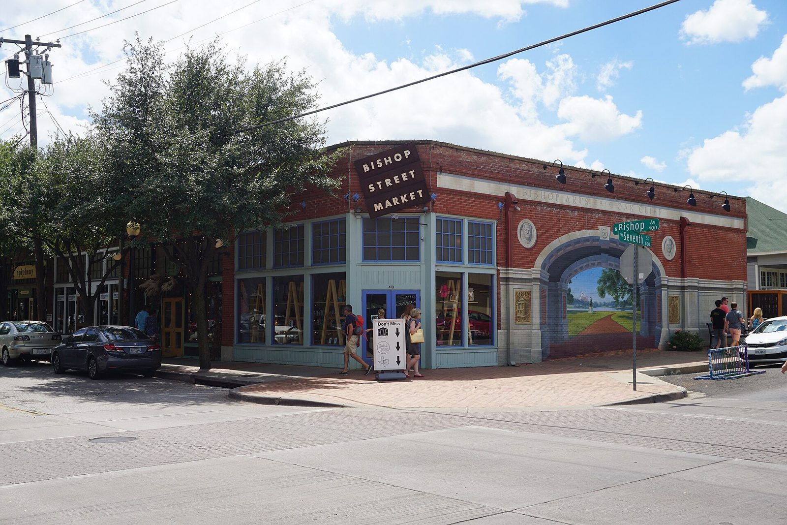 The brick Bishop Street Market building on a corner in the Bishop Arts District of Dallas
