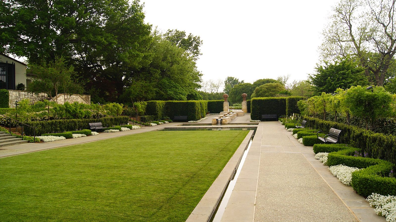 Formal hedged lawns and garden beds at the Dallas Arboretum and Botanical Garden