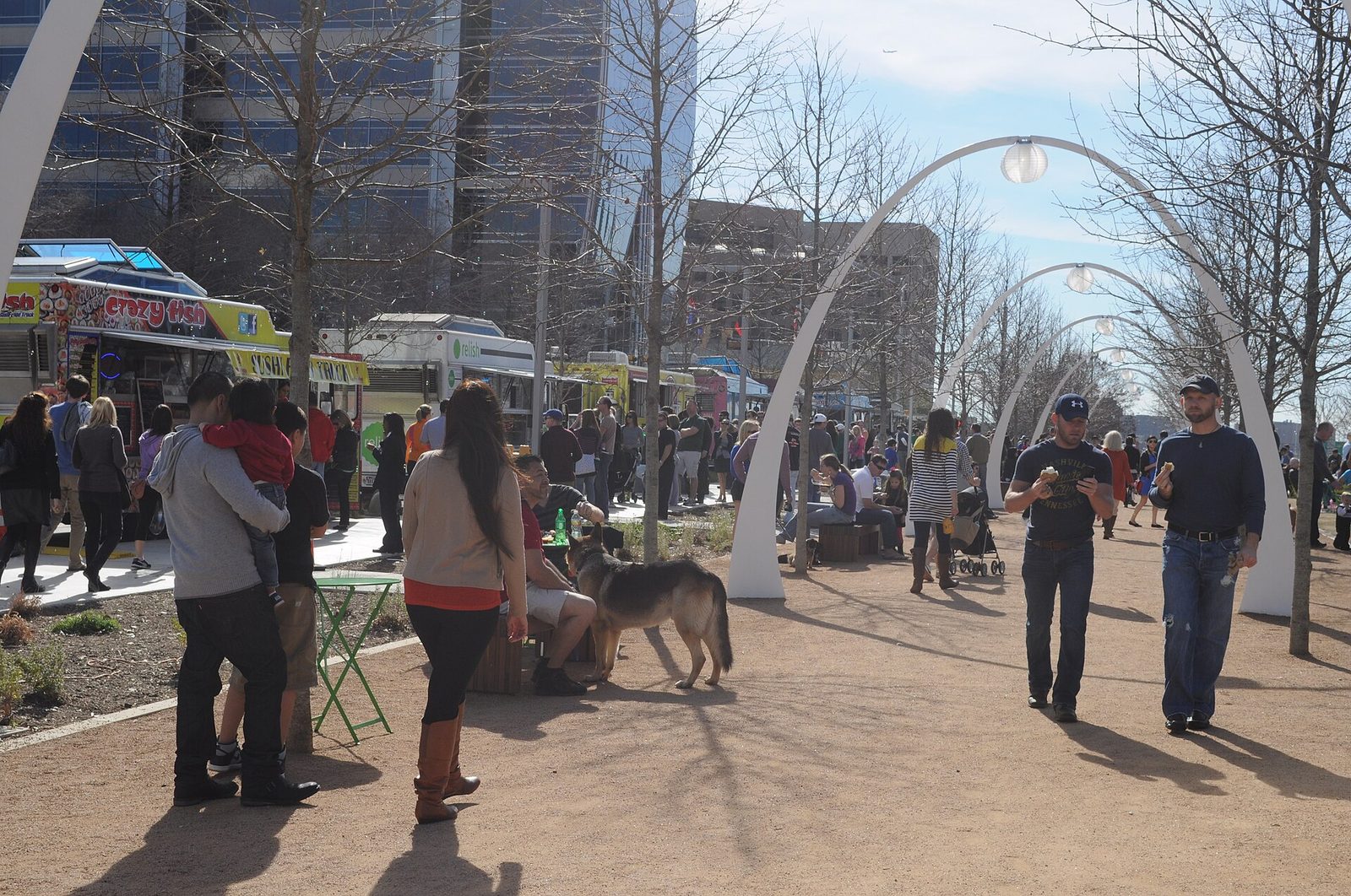 Food trucks and crowds at Klyde Warren Park, one of the free Dallas attractions in the Arts District