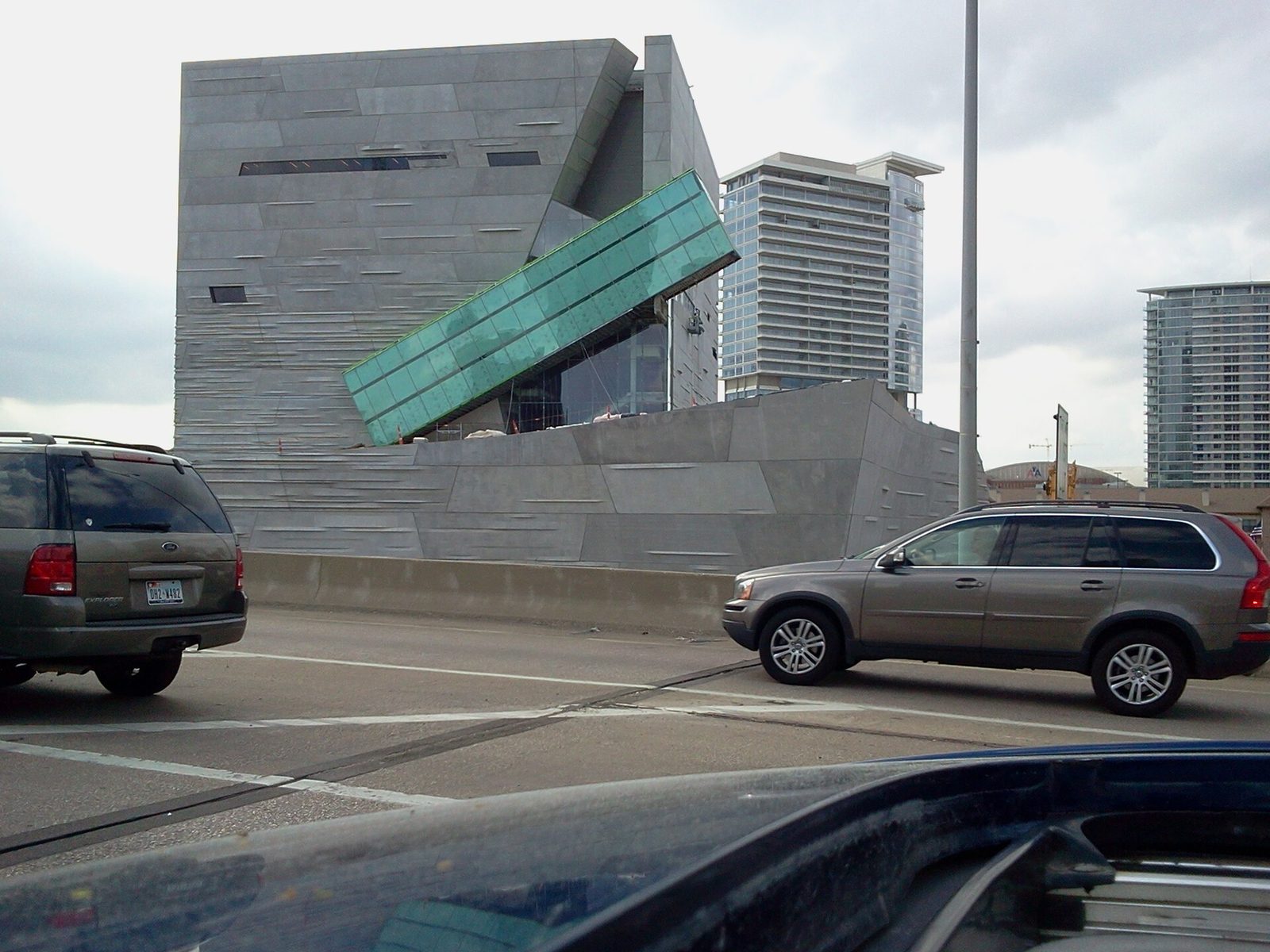 The angular stone facade of the Perot Museum in the Victory Park area of Dallas
