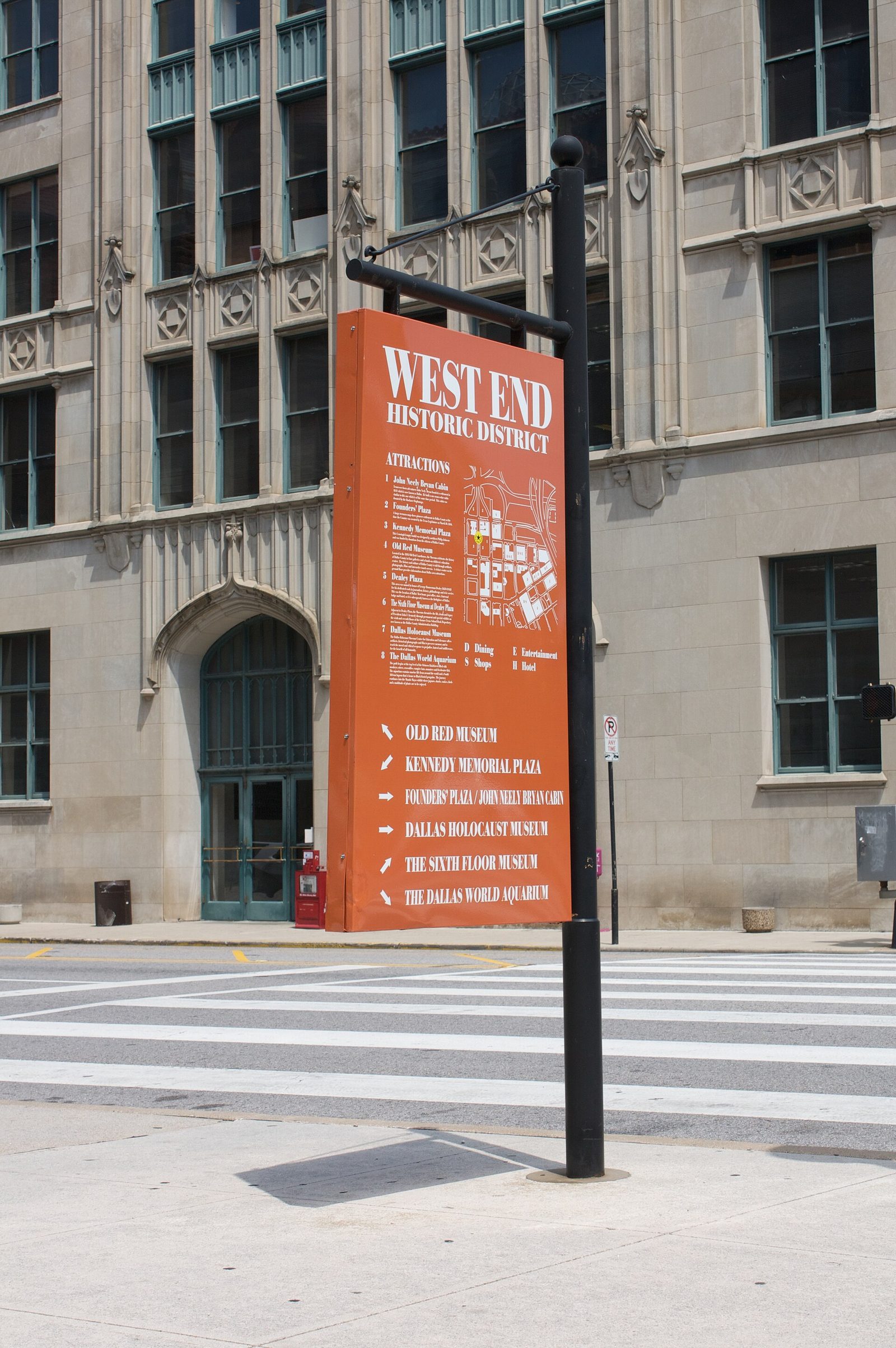 A West End Historic District banner on a street pole in downtown Dallas